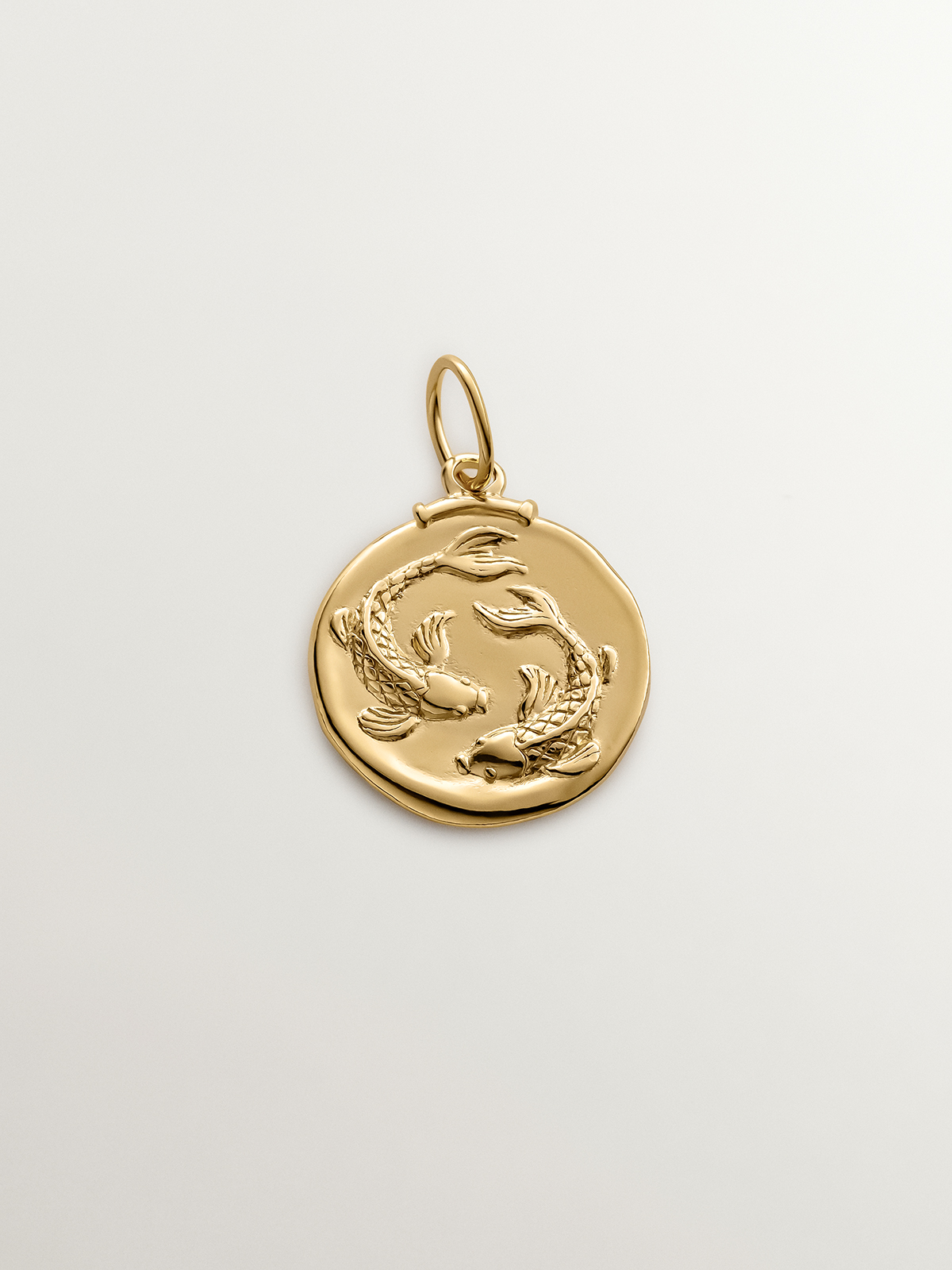 Pisces Charm made from 925 silver bathed in 18K yellow gold.