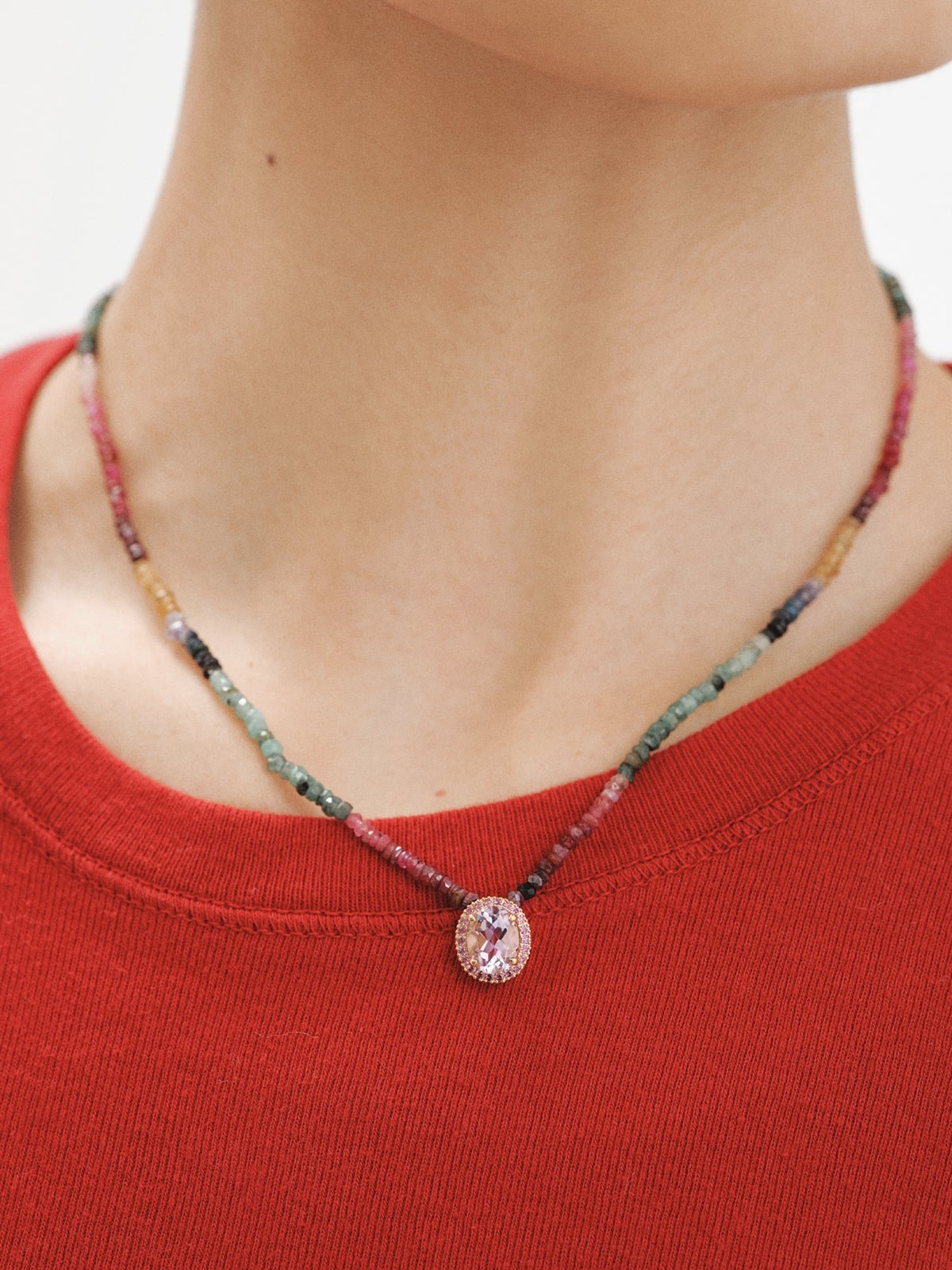 925 silver necklace bathed in 18K yellow gold with multicolor sapphires, pink rhodolite, and purple amethyst.
