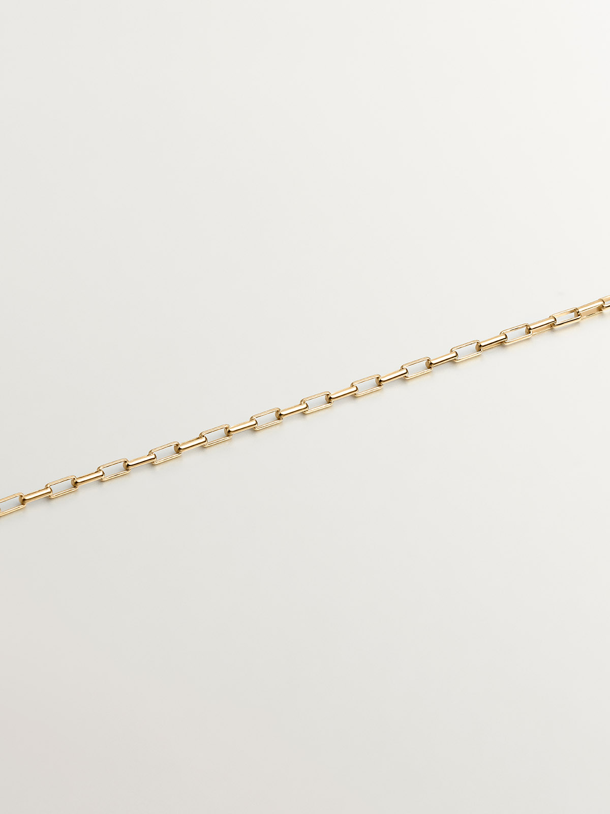 925 Silver chain bathed in 18K yellow gold with rectangular links.