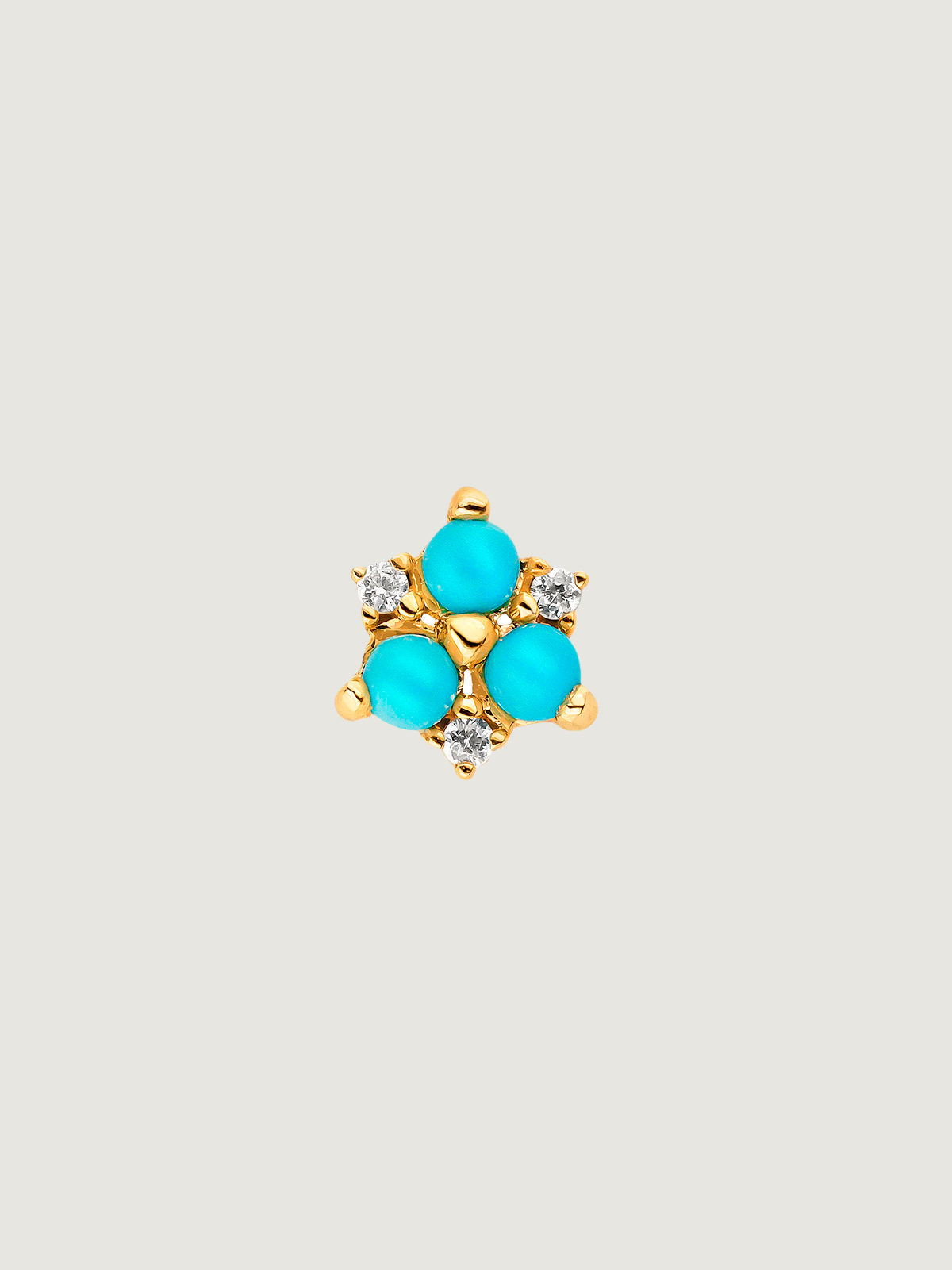 Individual 9K yellow gold earring with turquoise and white sapphires.