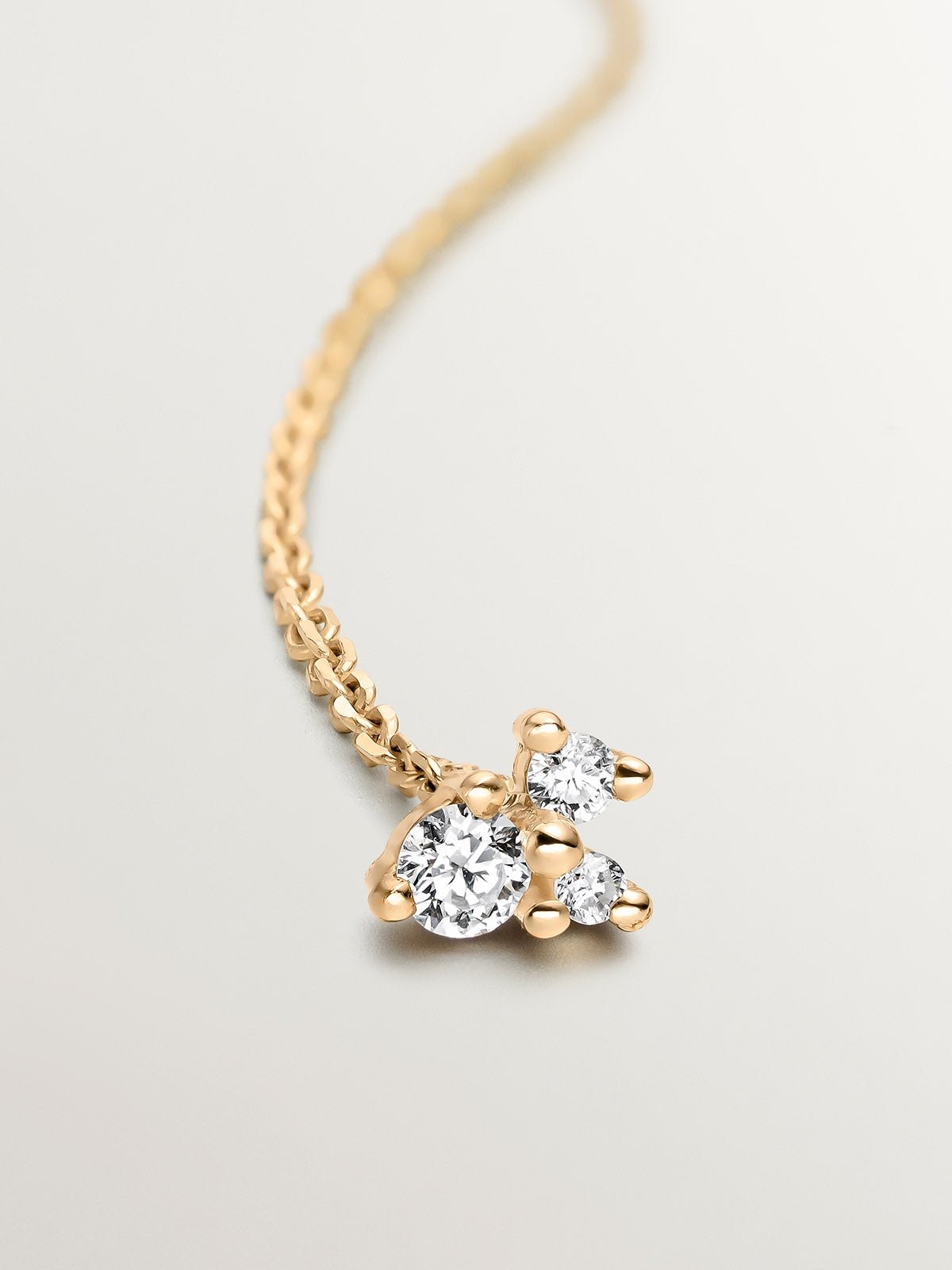 18K yellow gold single earring with chain and diamonds