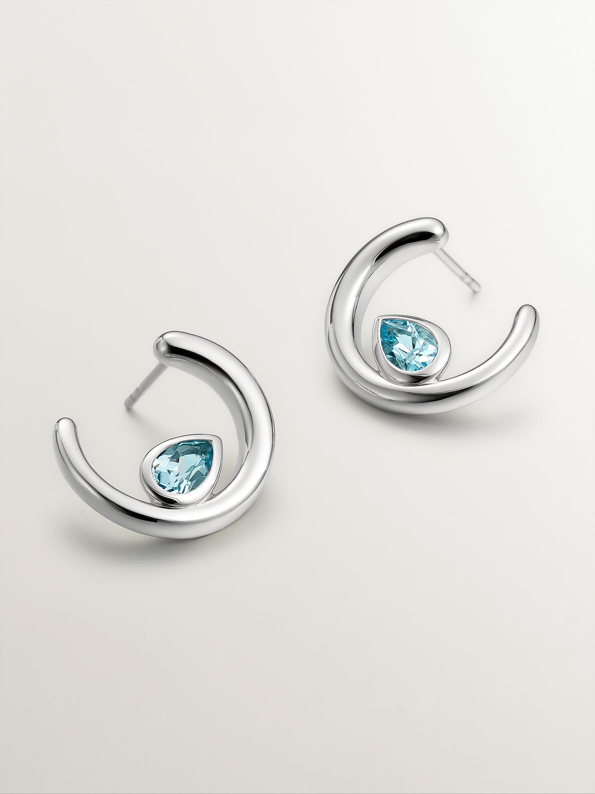 Pendientes de aro de plata 925 con 2 topacios azul sky