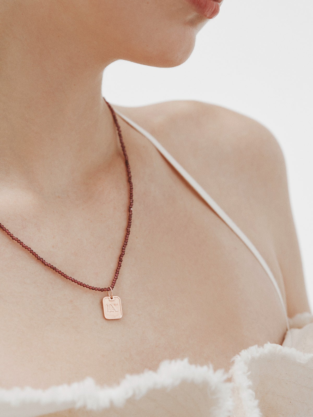 Charm de plata 925 bañada en oro rosa de 18K con número 9