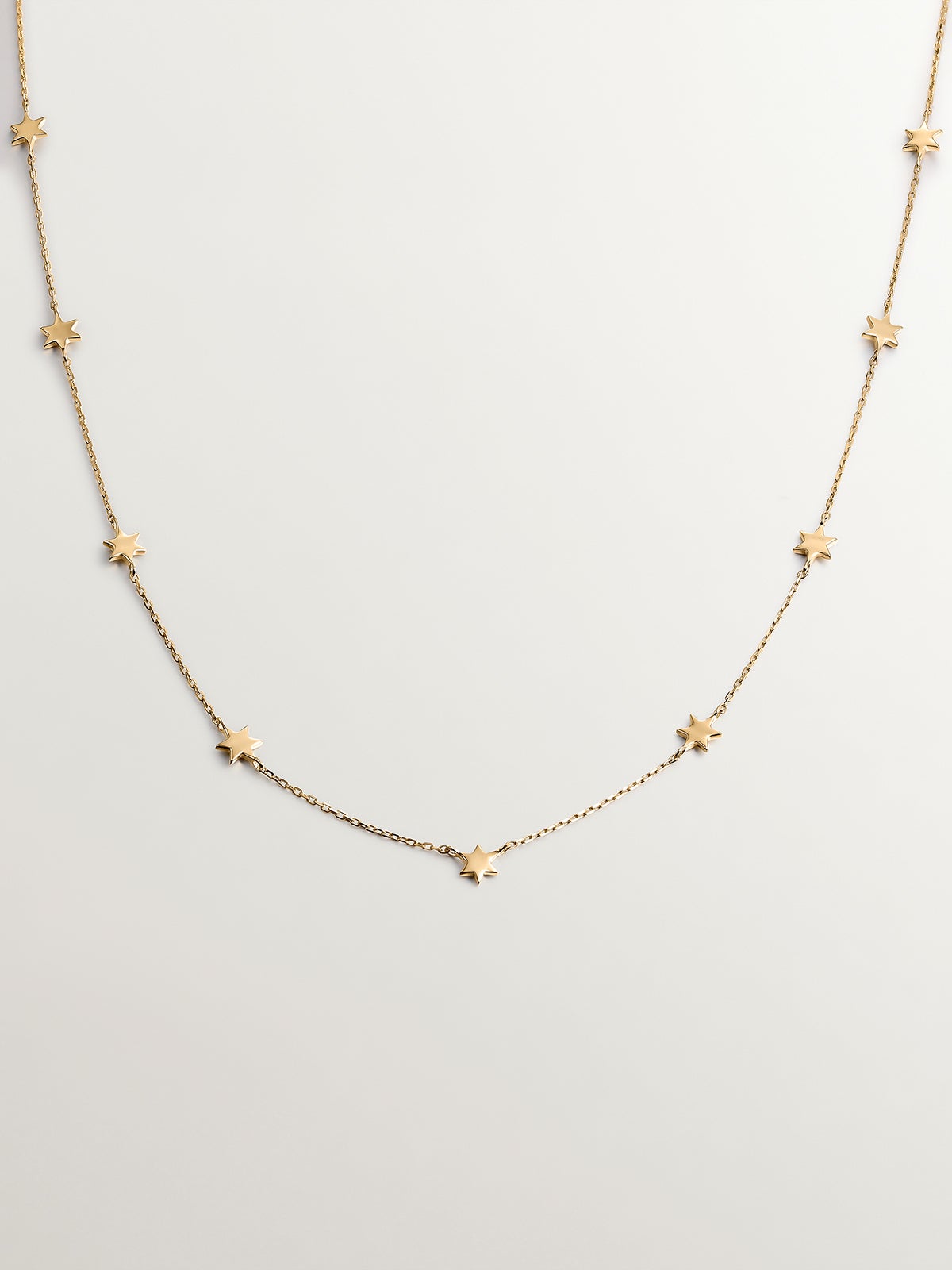 Collar de oro amarillo de 9K con estrellas
