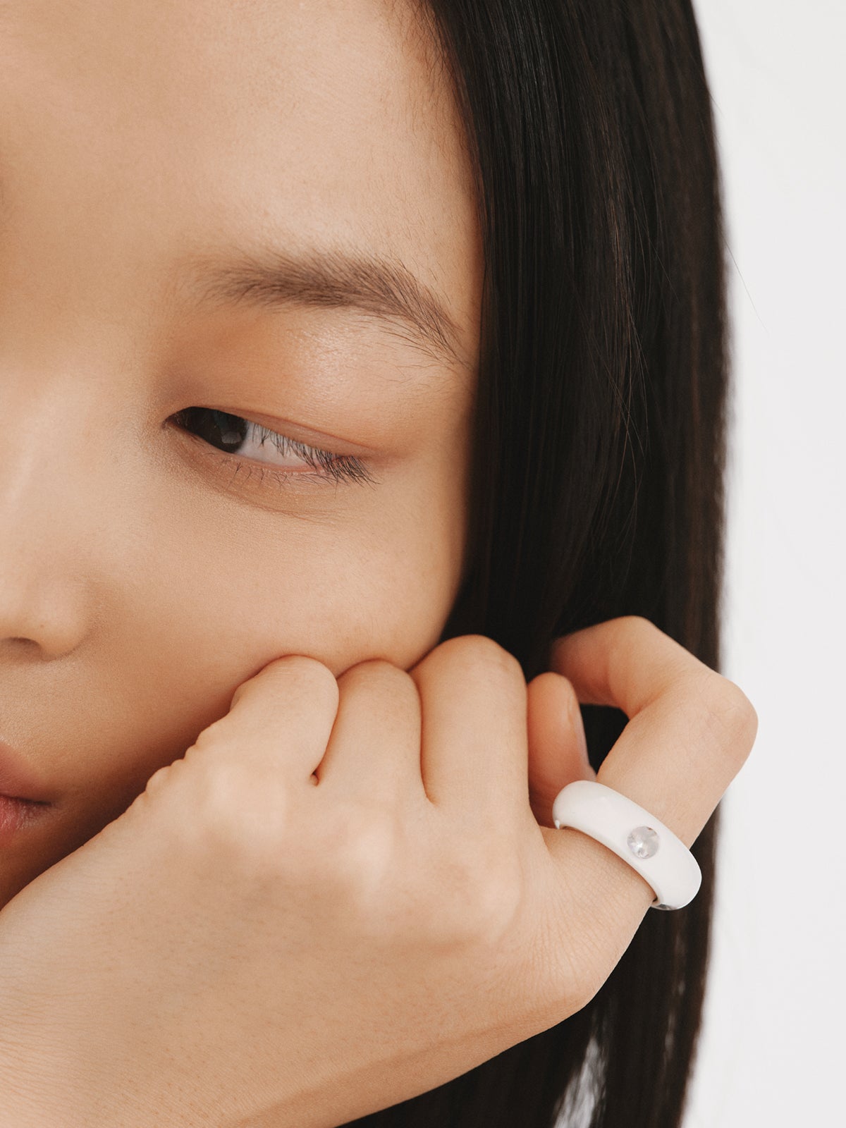 925 silver ring with white enamel and zircon suspended in resin