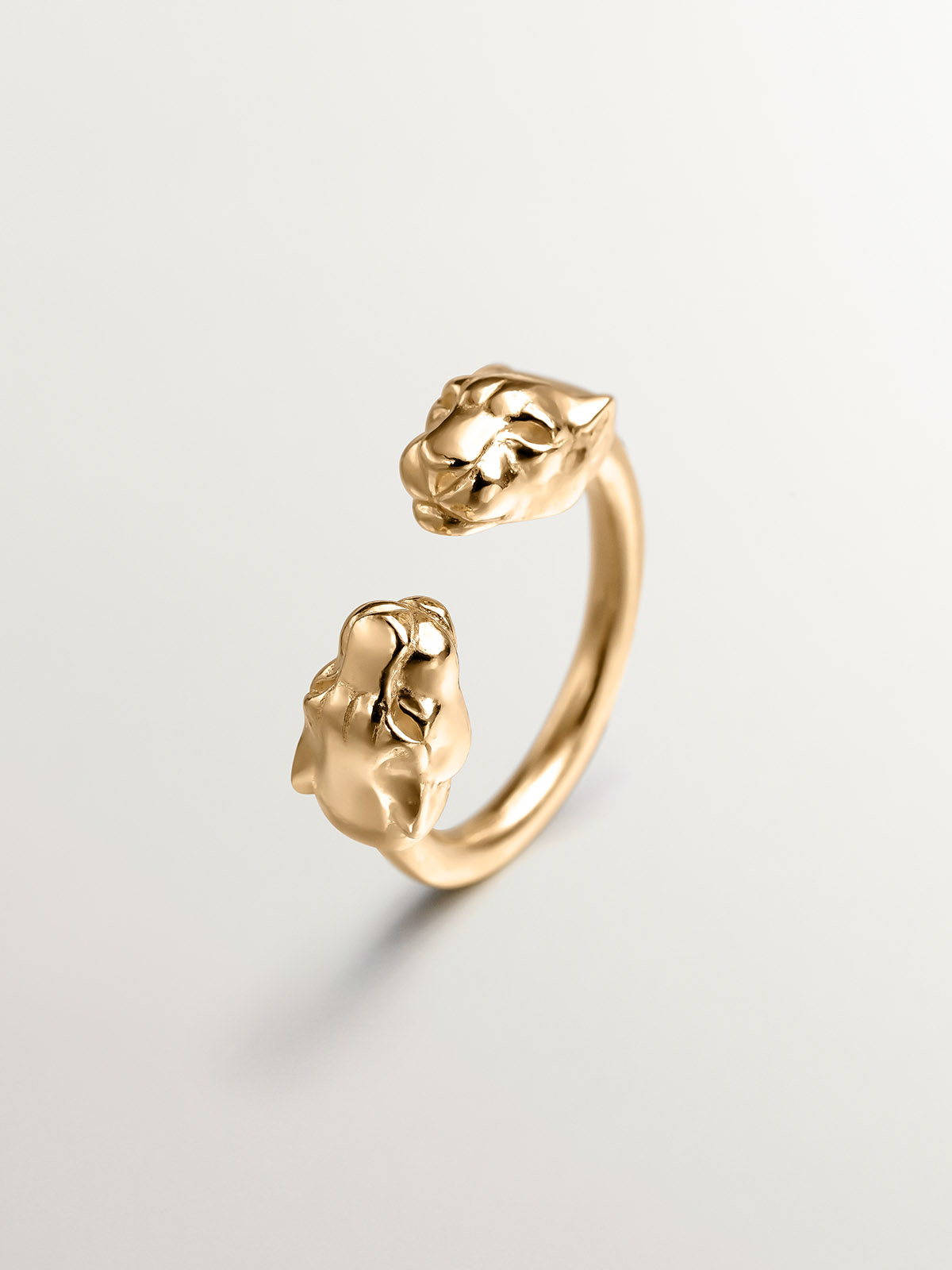 You and I ring made of 925 silver, bathed in 18K yellow gold with panther heads.