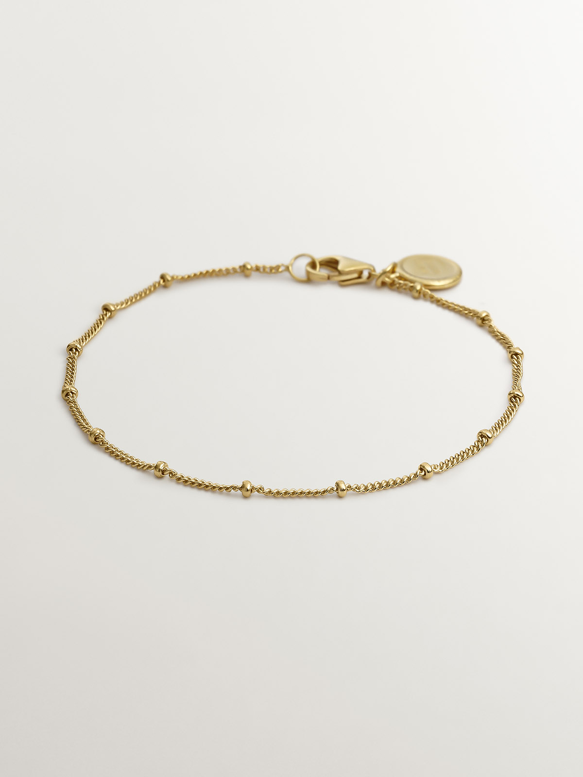 Chain bracelet with 925 silver beads bathed in 18K yellow gold.