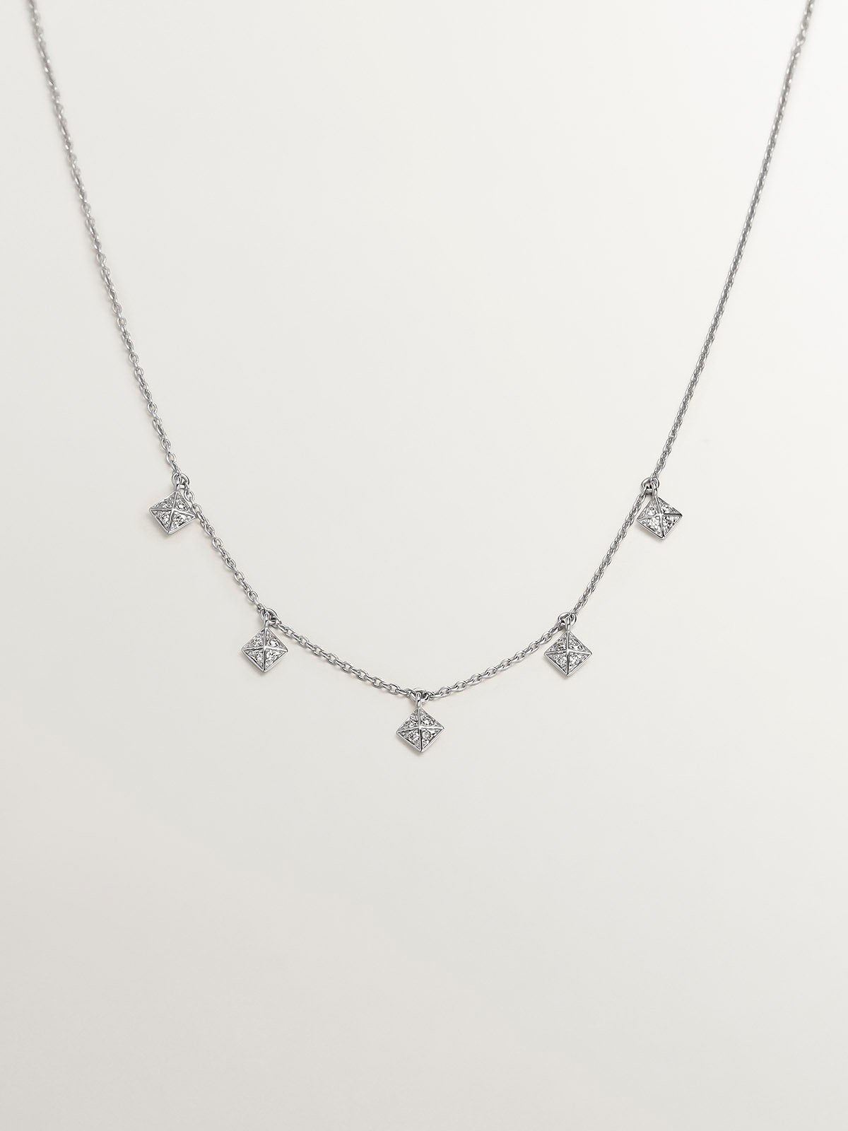 18K white gold necklace with geometric shapes and diamonds