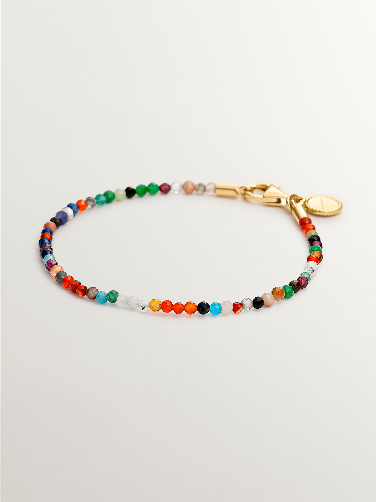 925 Silver bracelet bathed in 18K yellow gold with multicolor gemstone beads.