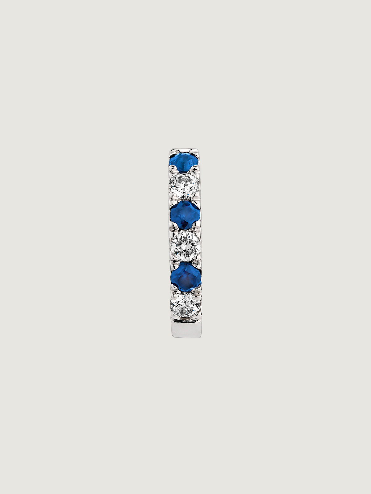 Individual small 9K white gold hoop earring with blue sapphires and diamonds