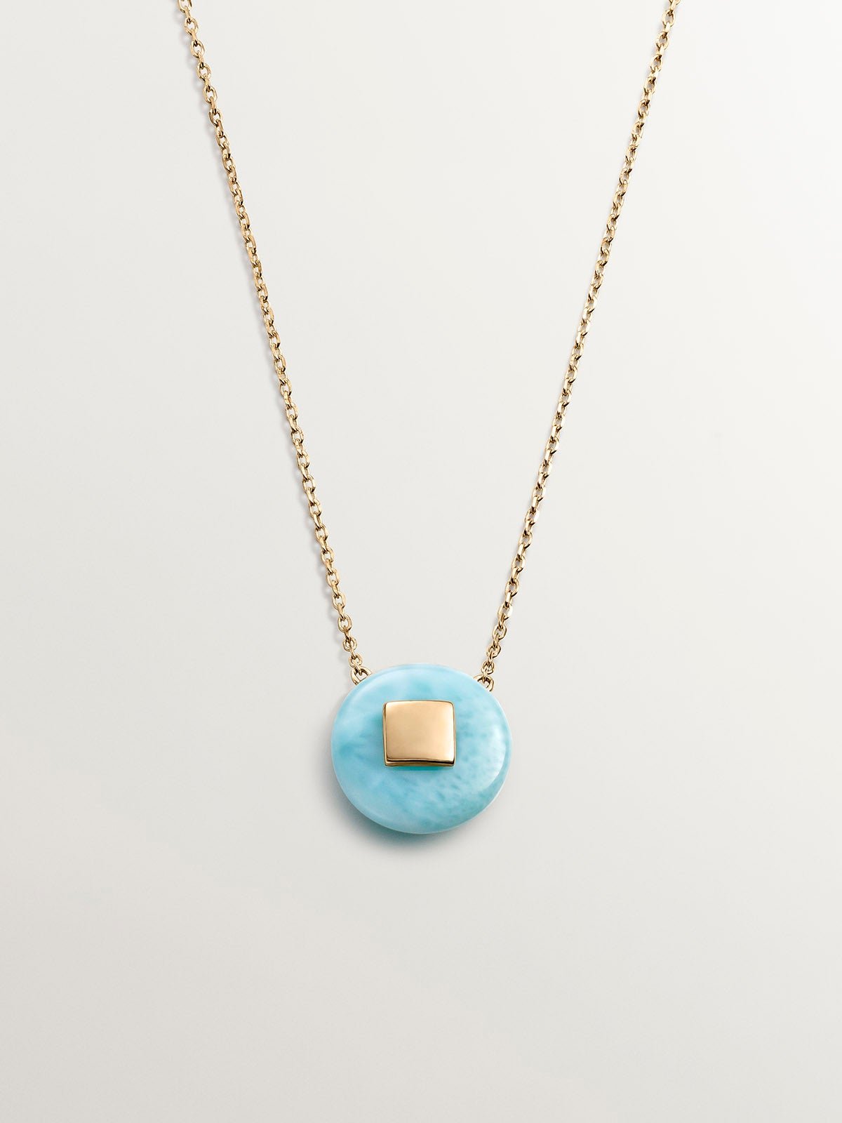 9K yellow gold pendant with blue larimar