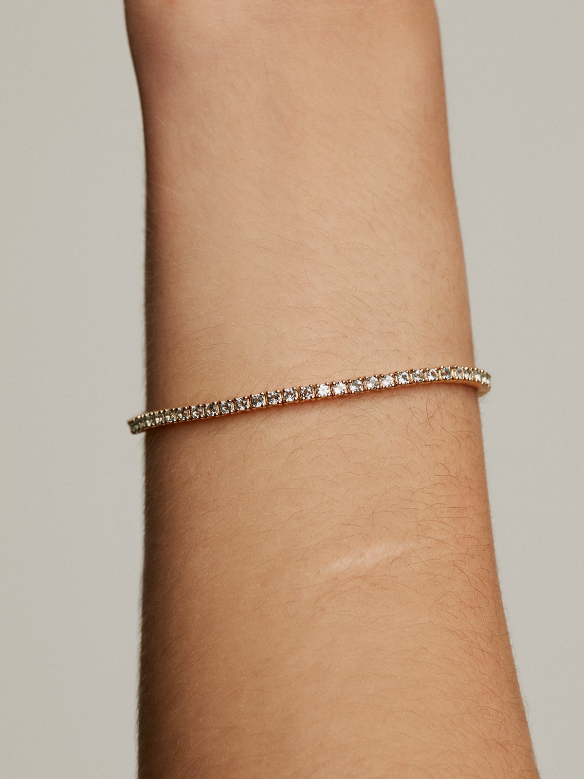 Pulsera de plata 925 bañada en oro amarillo de 18K con topacios azul swiss
