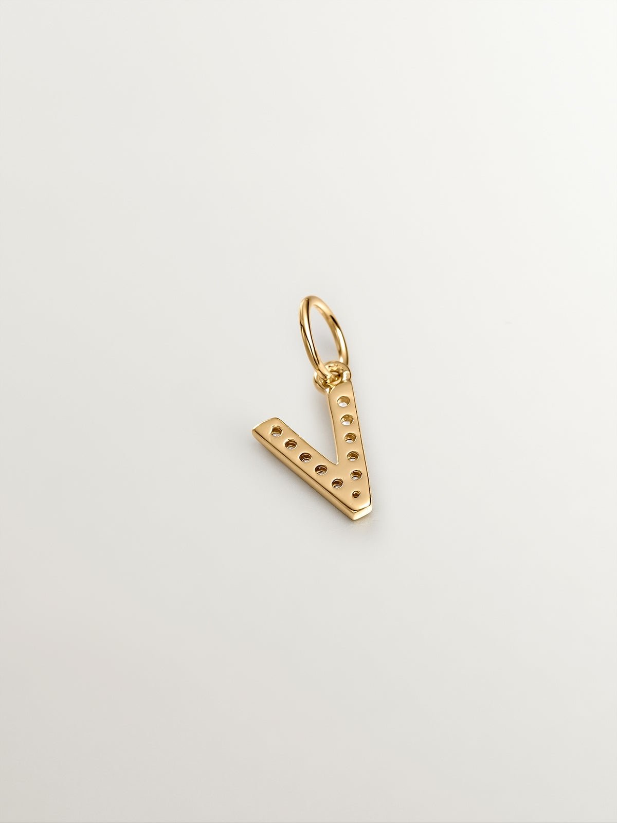 Charm en argent 925 plaqué en or jaune 18K et topazes blanches initial V