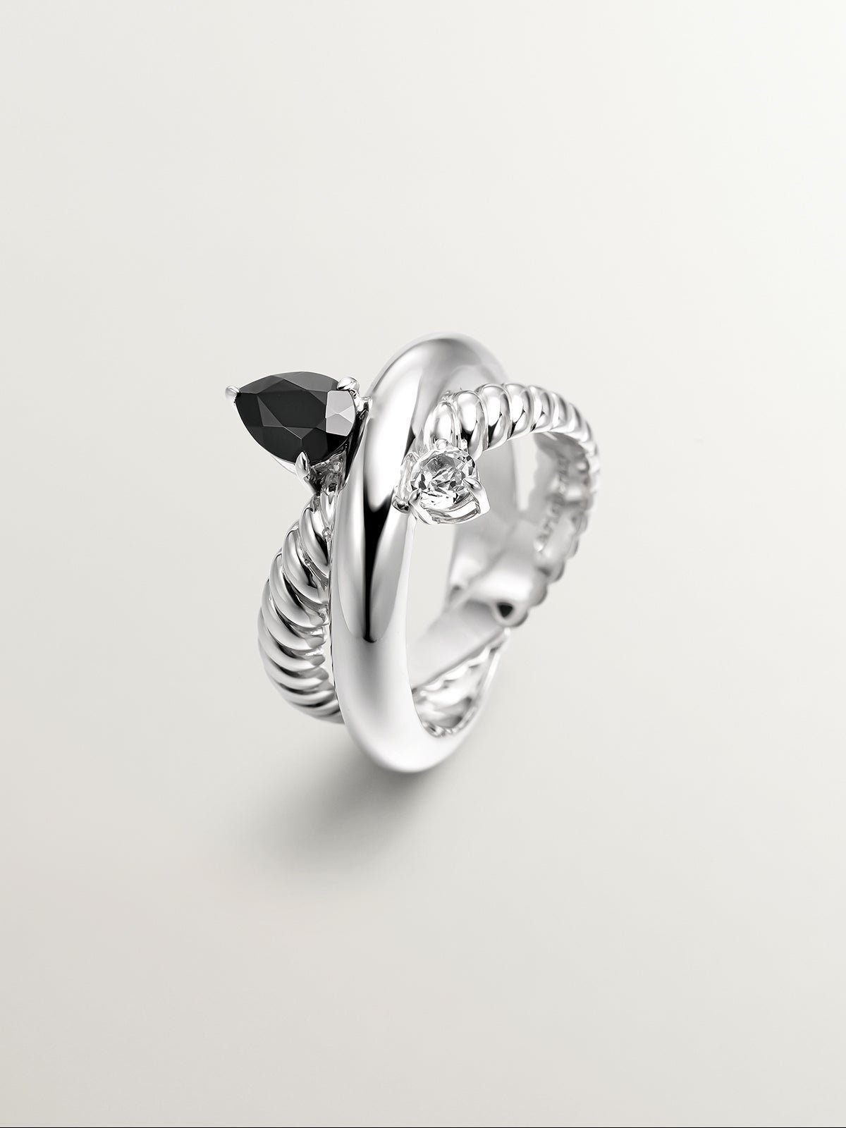 Anillo multibrazo de plata 925 con espinela negra y topacio blanco