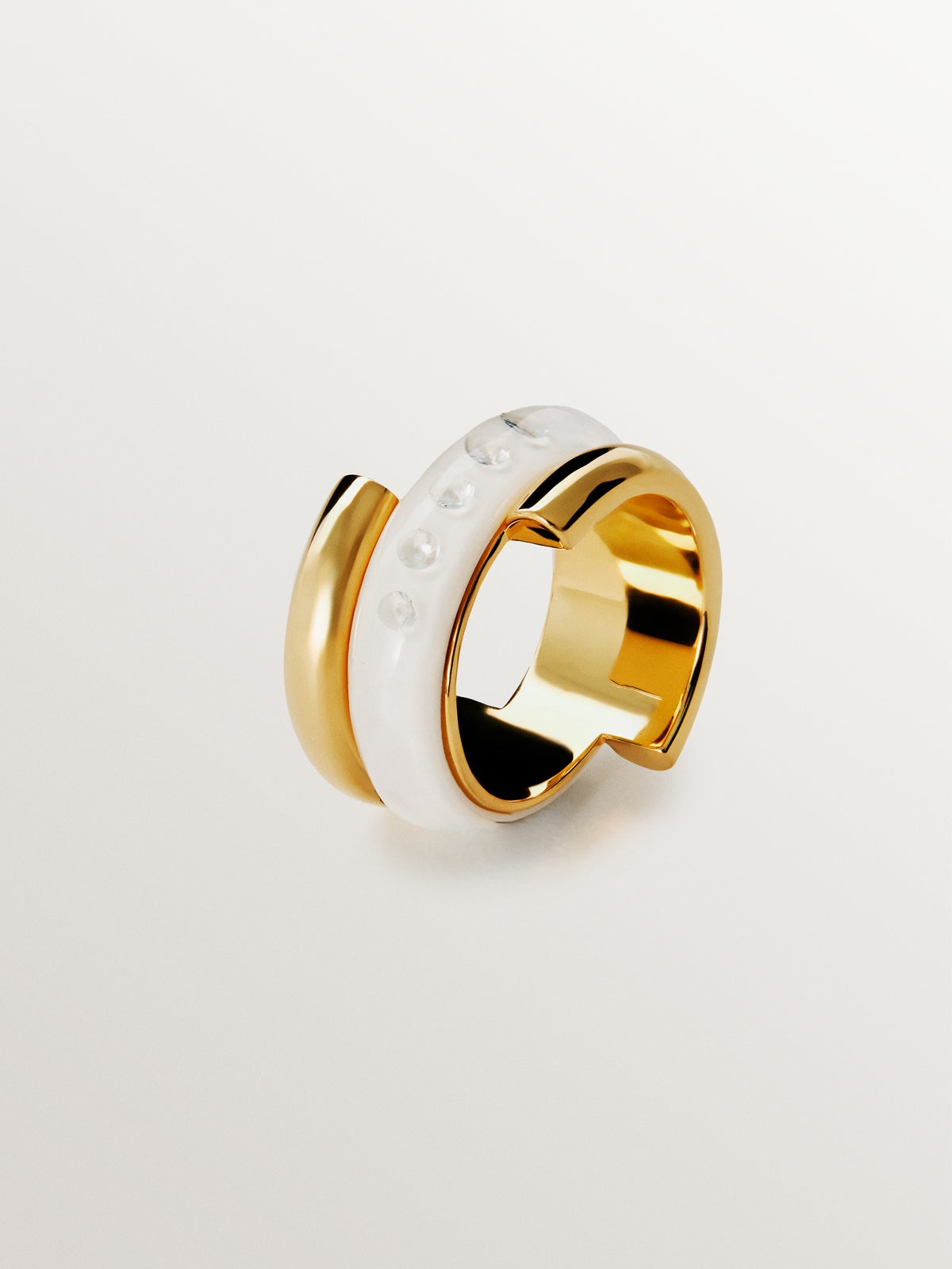18K yellow gold plated 925 silver ring with white enamel and zircons suspended in resin