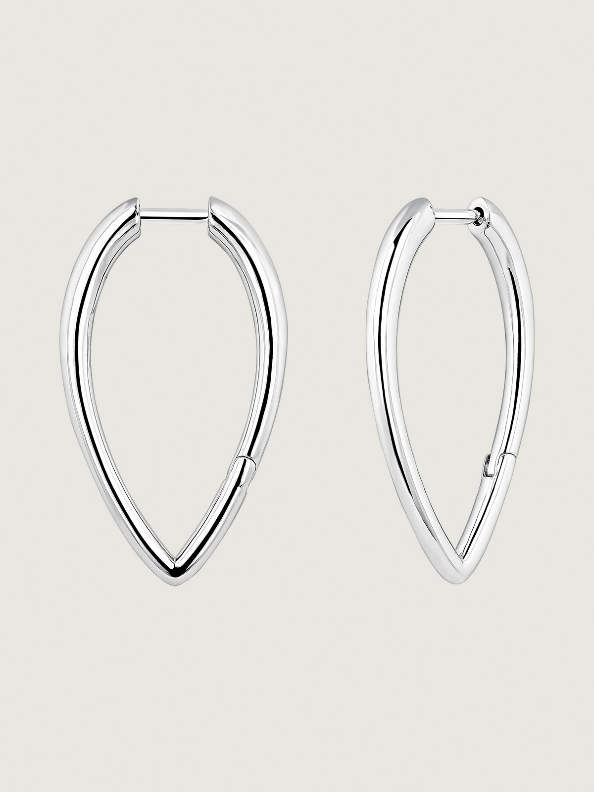 Large 925 silver hoop earrings in drop shape.