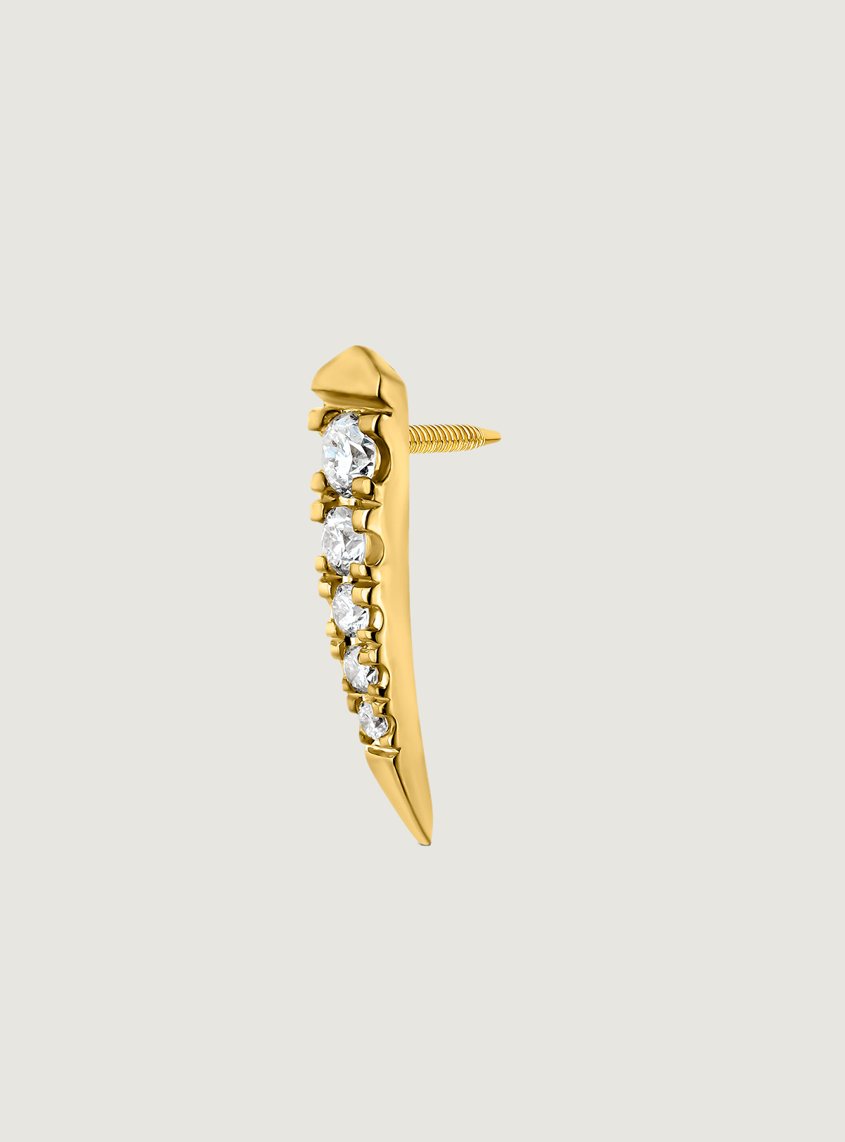 Individual 18K yellow gold earring with diamonds.