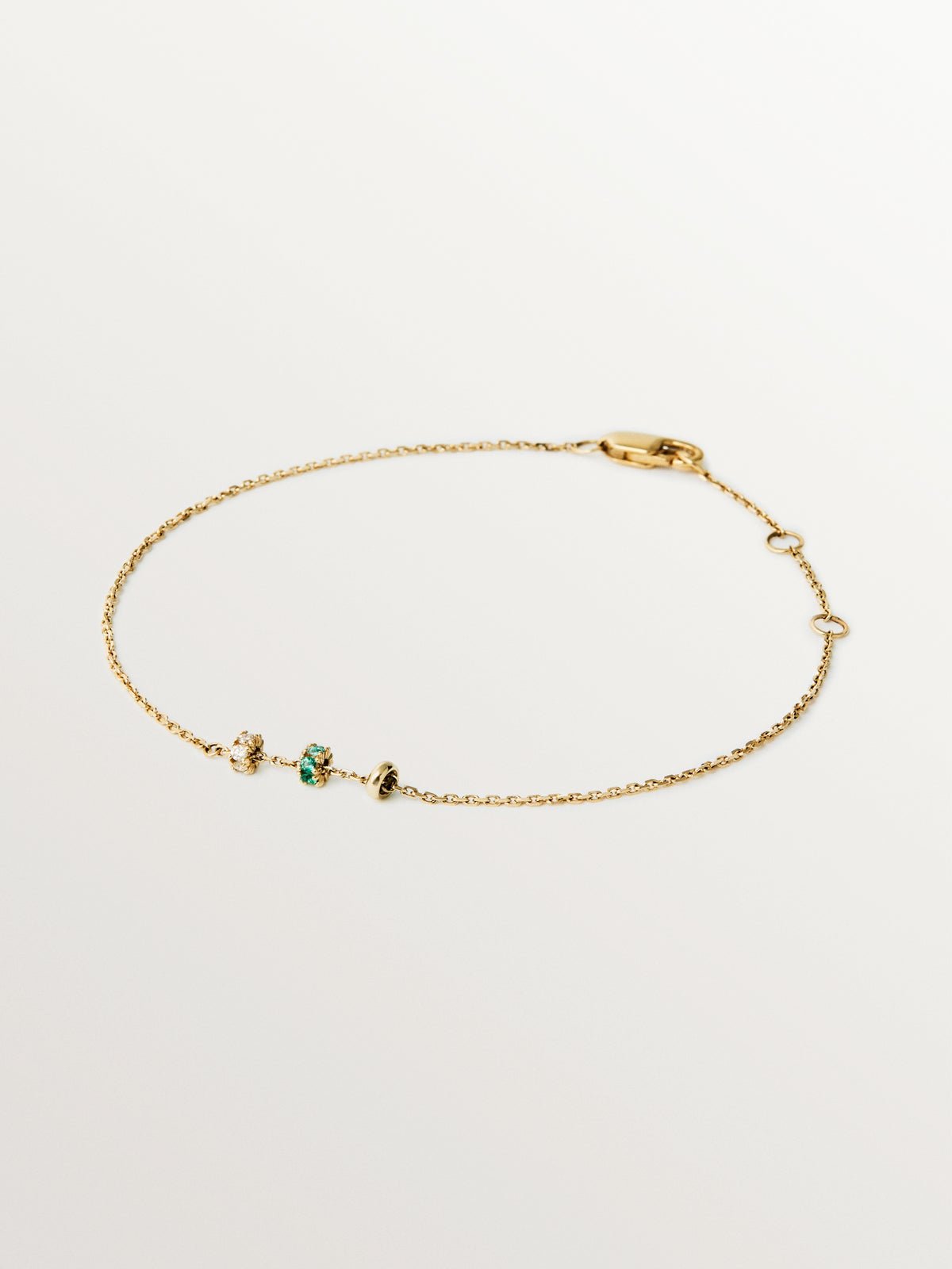 9K yellow gold bracelet with emeralds and diamonds