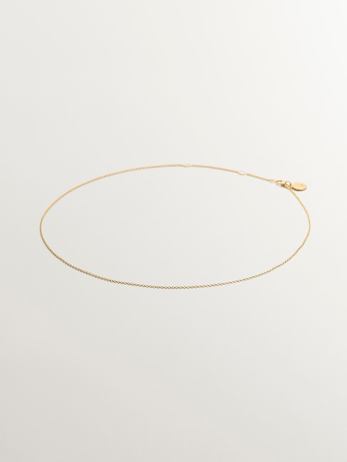 Simple adjustable 925 silver chain bathed in 18K yellow gold.