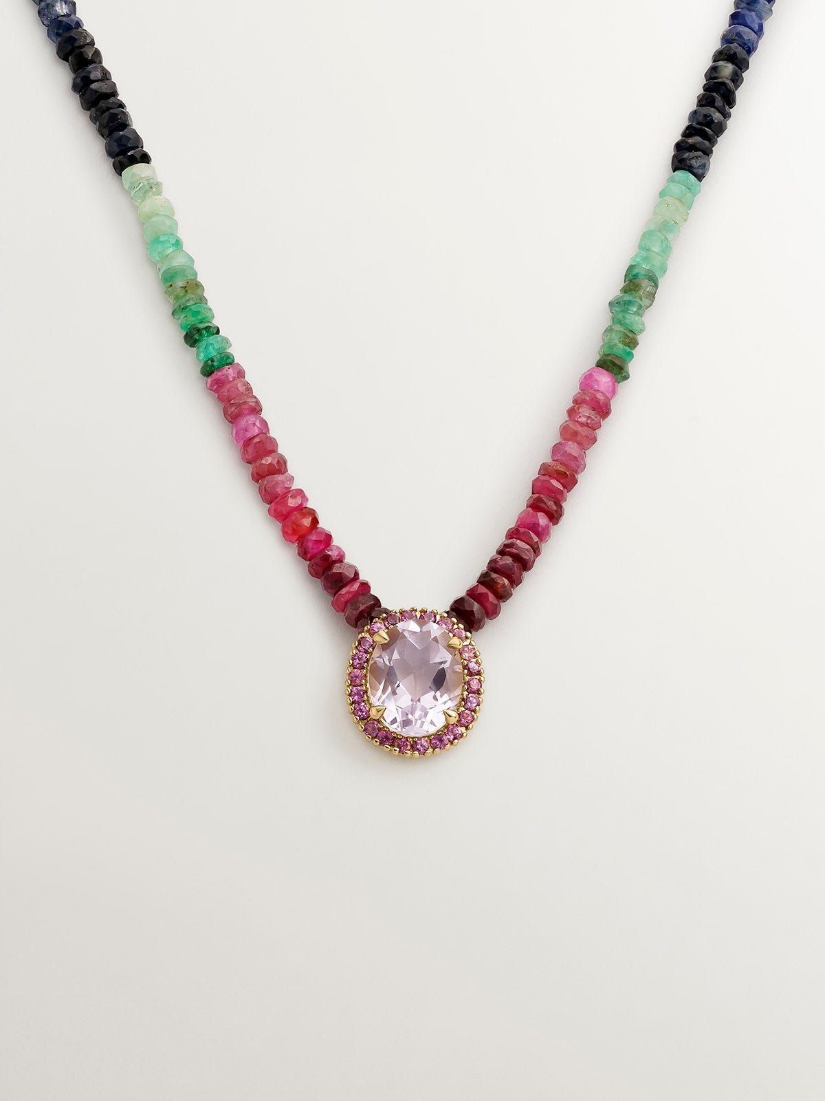 925 silver necklace bathed in 18K yellow gold with multicolor sapphires, pink rhodolite, and purple amethyst.