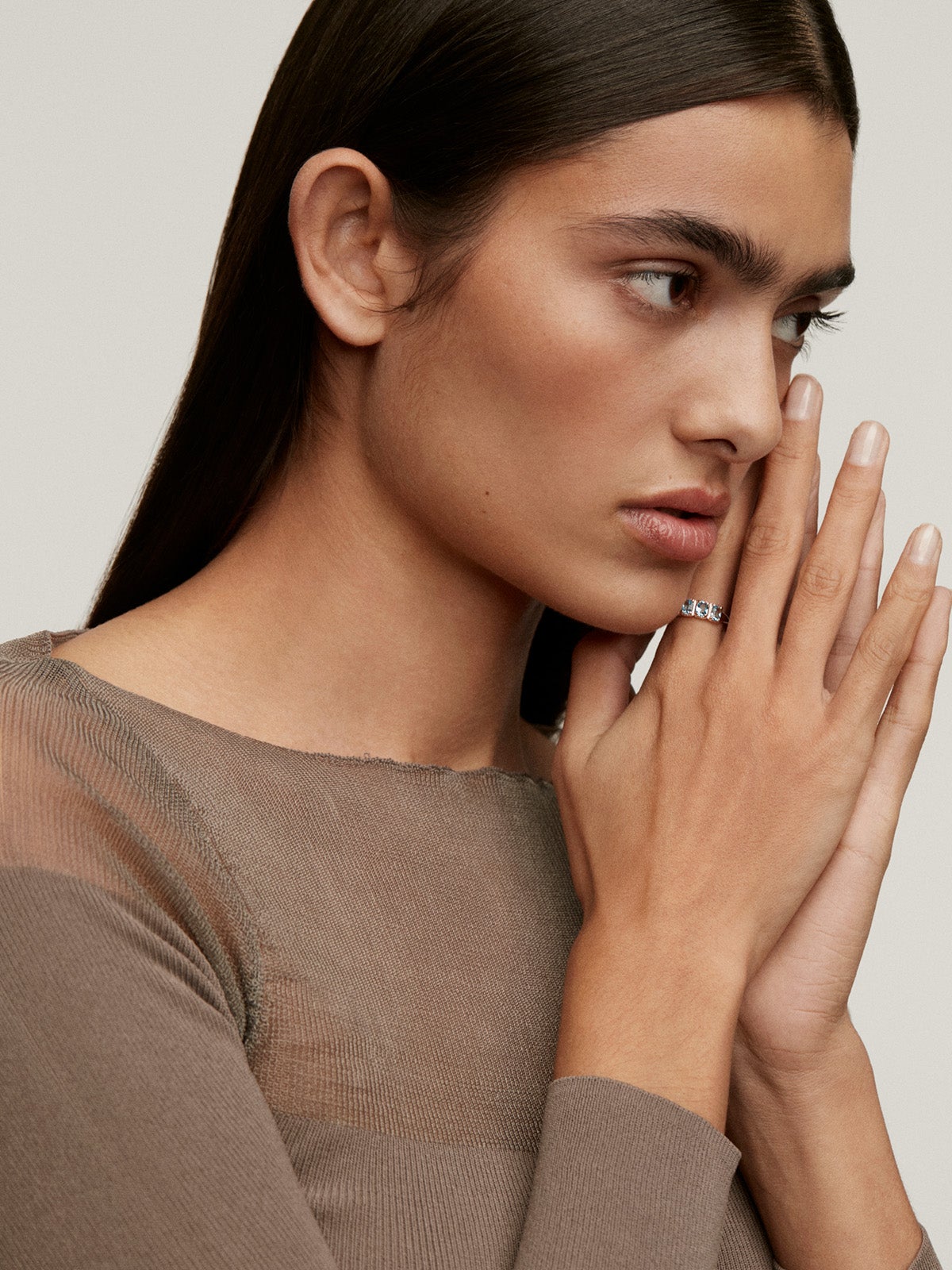 925 Silver ring coated in 18K rose gold with Swiss blue topaz.