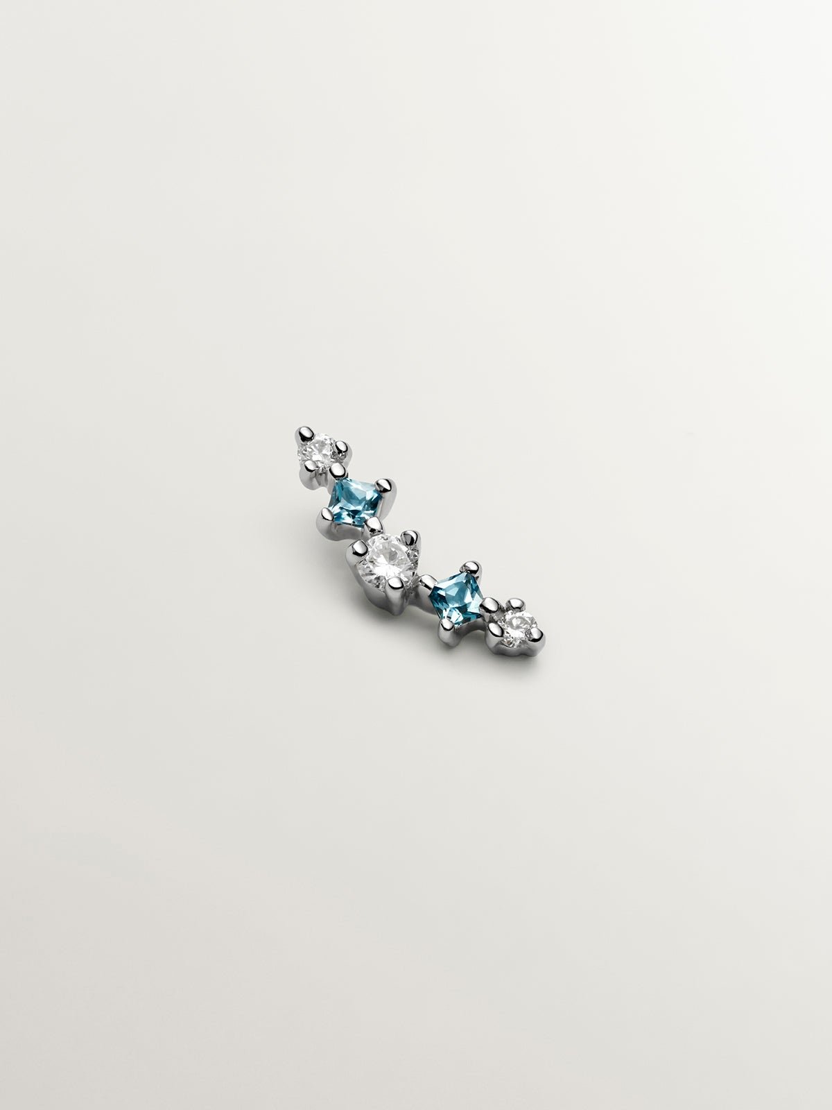 Pendiente individual de oro de 18K con topacio azul