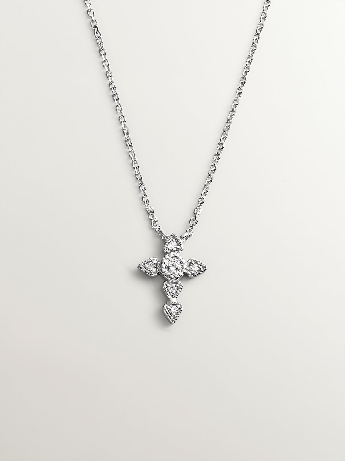9K white gold pendant with diamond cross.