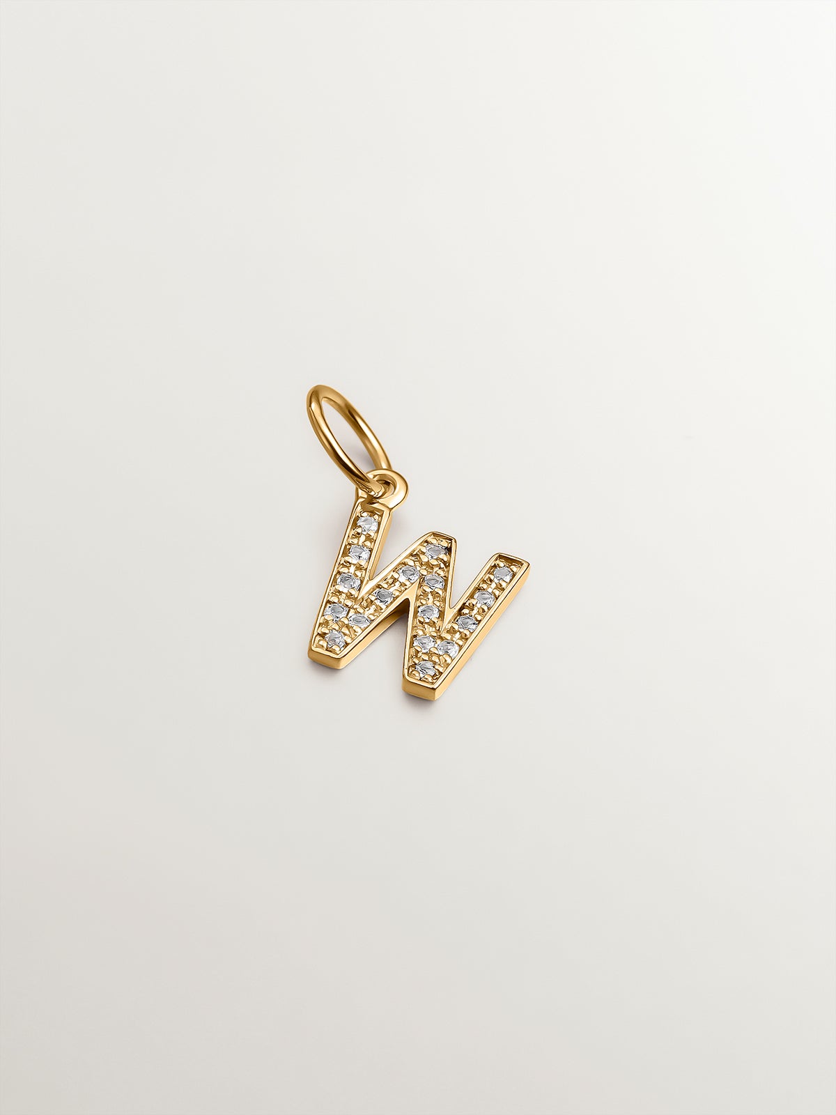 925 Silver charm plated in 18K yellow gold with white topaz initial w
