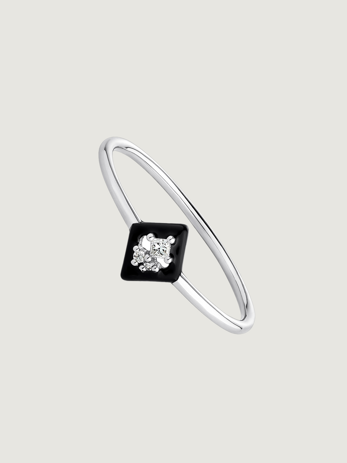 18K white gold ring with diamonds and black enamel.