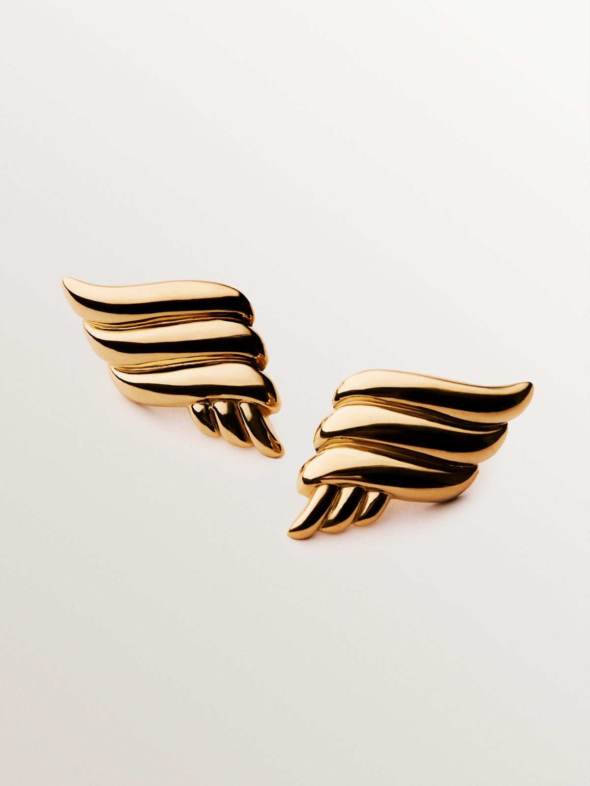 18K yellow gold plated 925 silver earrings with fluid shape