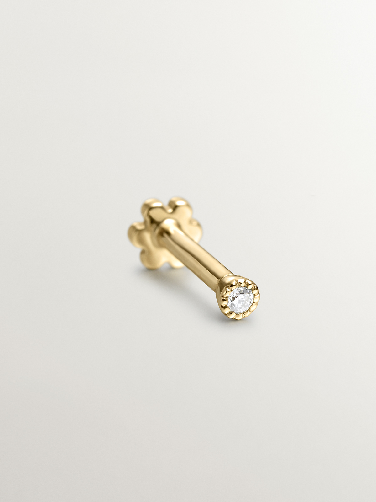 Individual 9K yellow gold piercing with diamond
