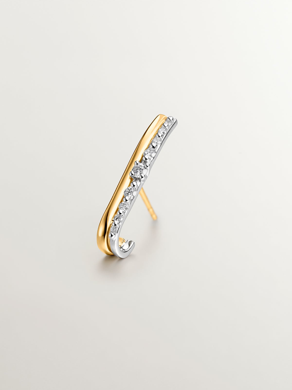 Individual left climber earring in 18K yellow and white gold with diamonds.