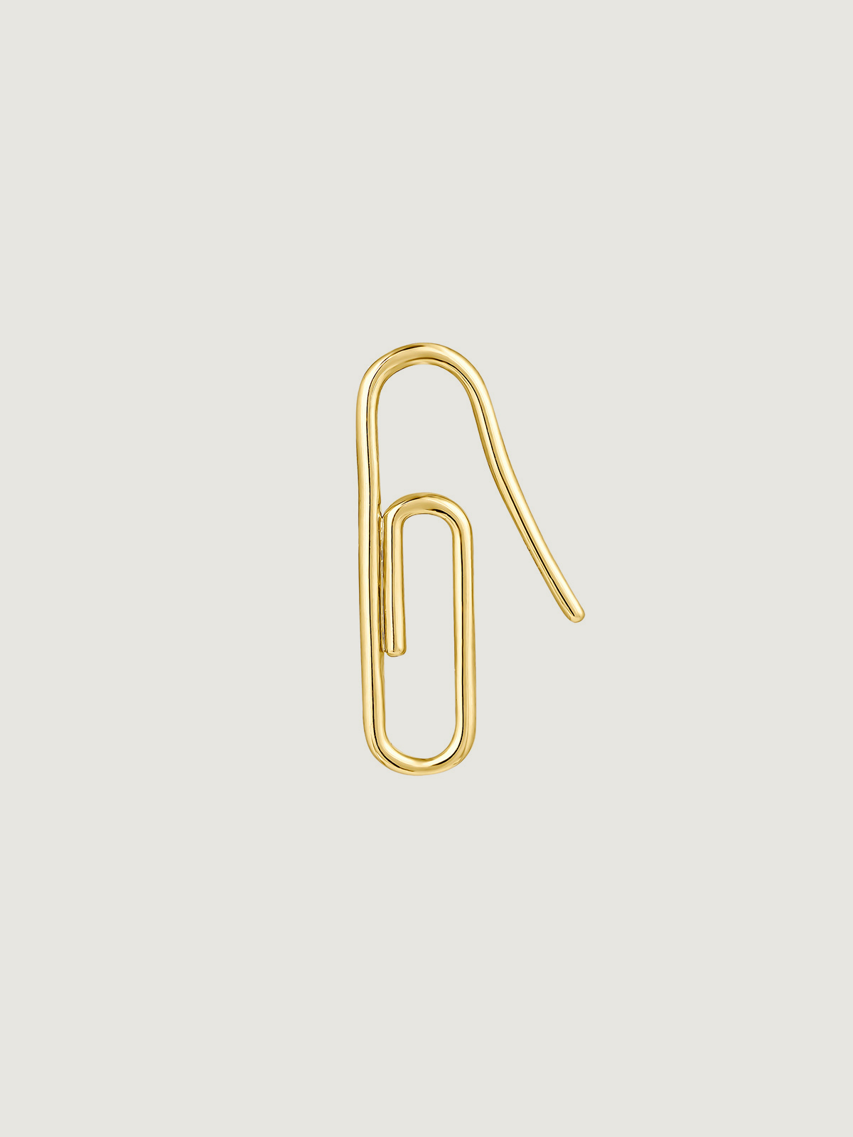 Individual 9K yellow gold earring in the shape of a clip.