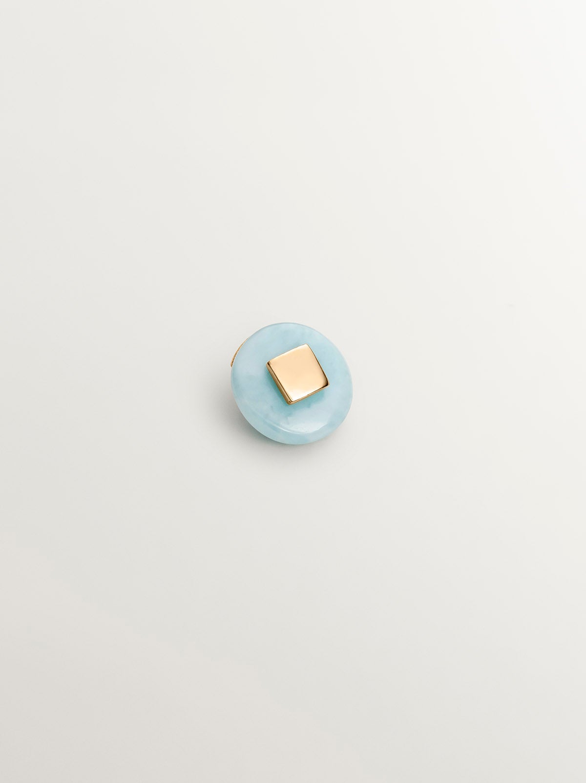 Pendiente individual de oro amarillo de 9K con larimar azul