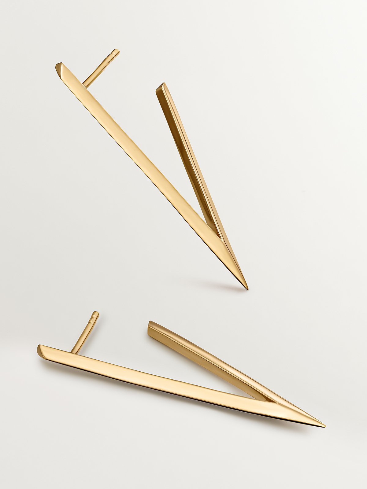 Large triangular earrings made of 925 silver coated in 18K yellow gold