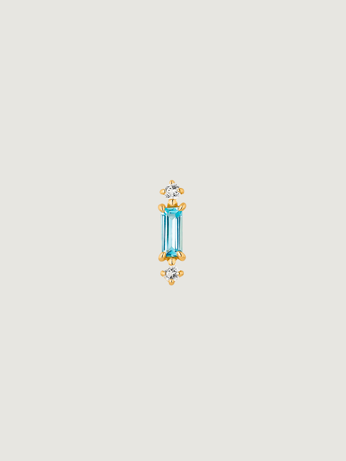 Individual 925 silver earring bathed in 18K yellow gold with sky blue and white topaz.