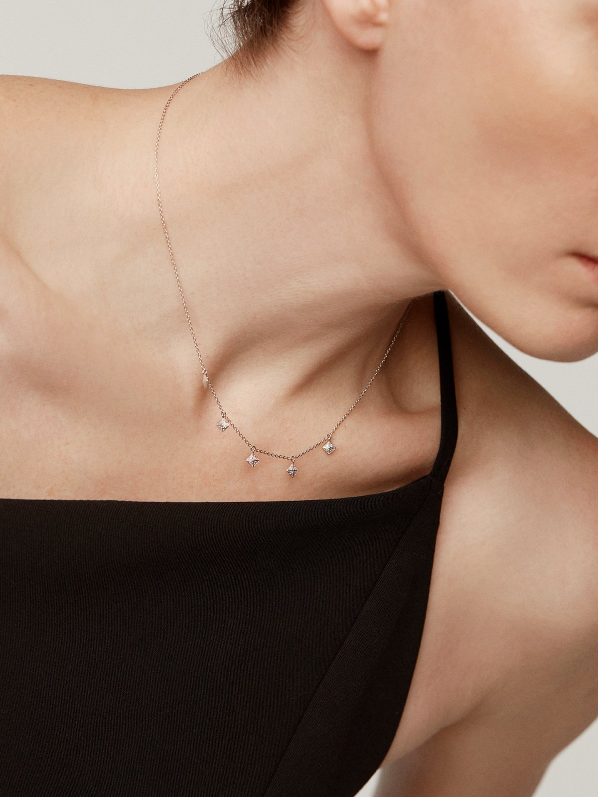 18K white gold necklace with geometric shapes and diamonds