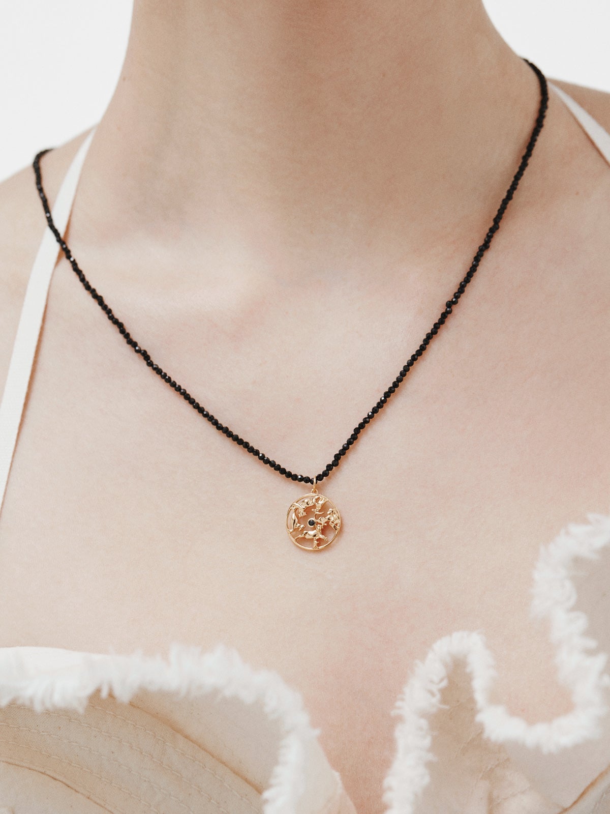 925 silver charm bathed in 18k yellow gold with black spinel and animals