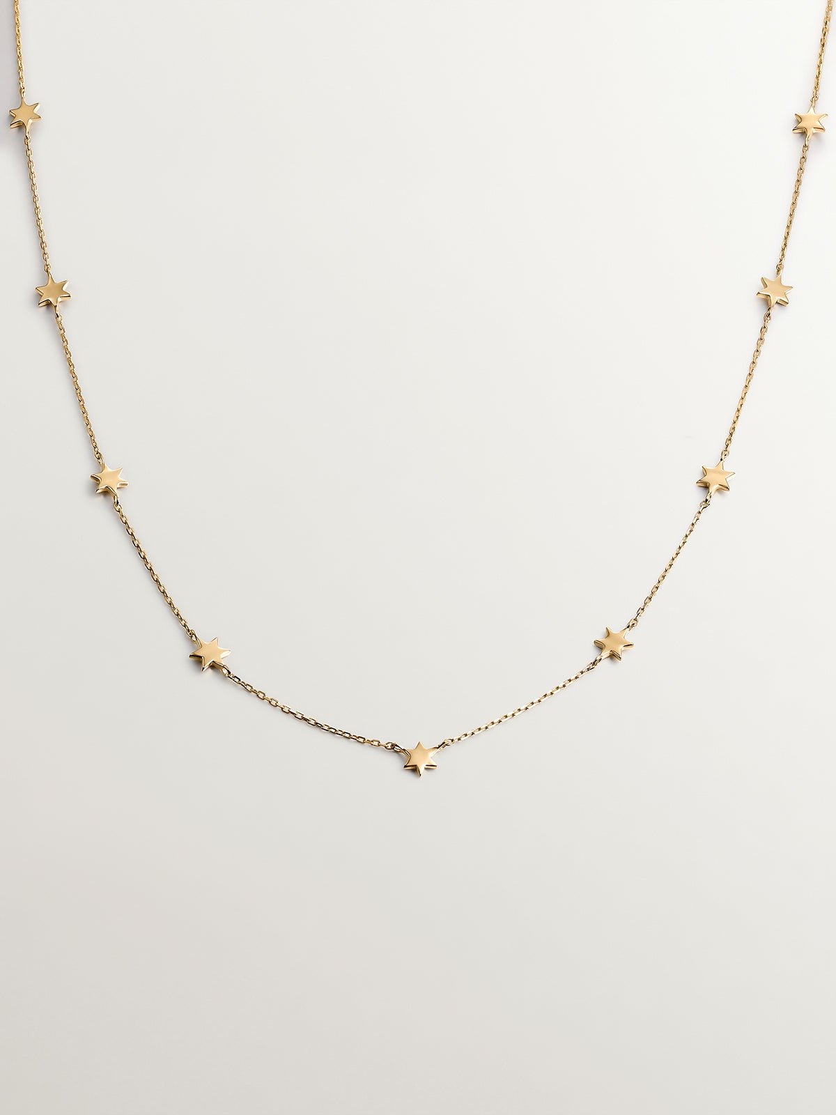 Collar de oro amarillo de 9K con estrellas