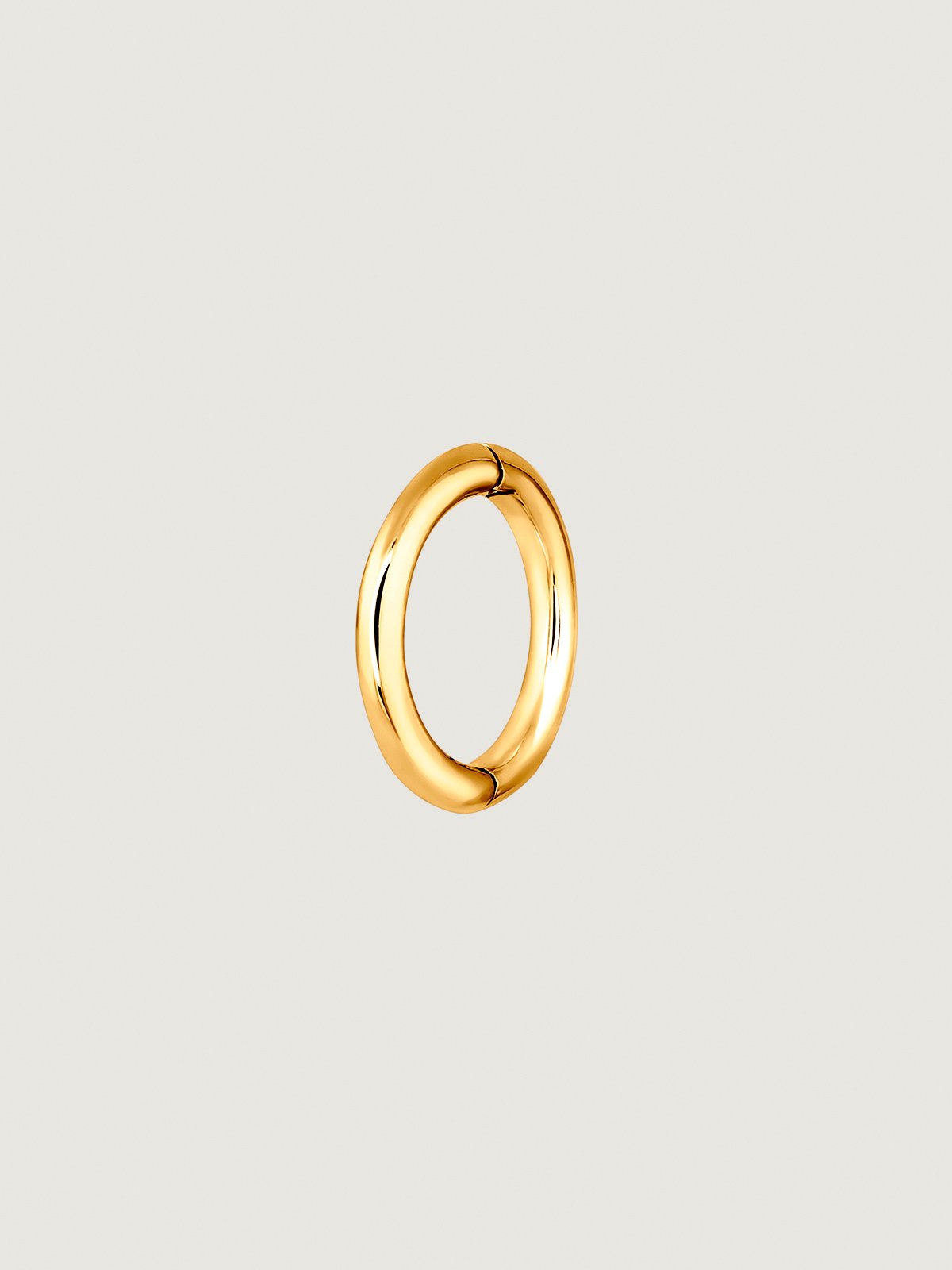 Small individual 9K yellow gold hoop earring.