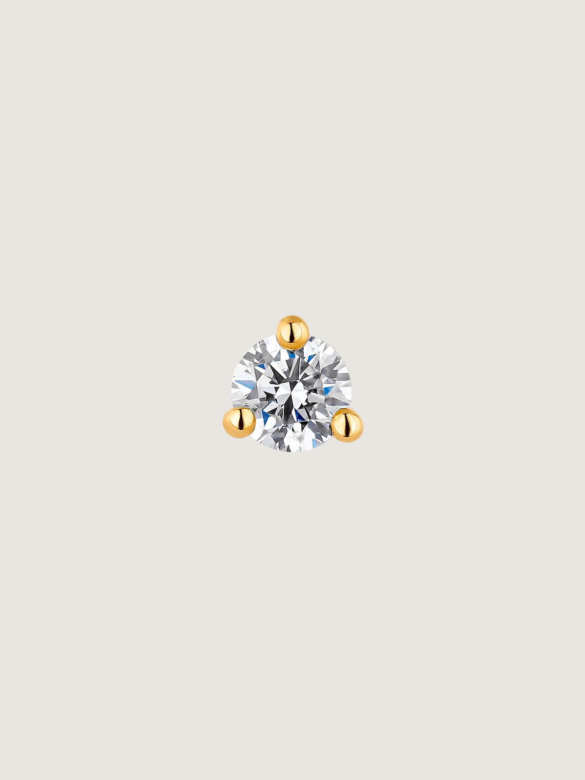 Single 18K yellow gold piercing with 0.04 cts diamond.