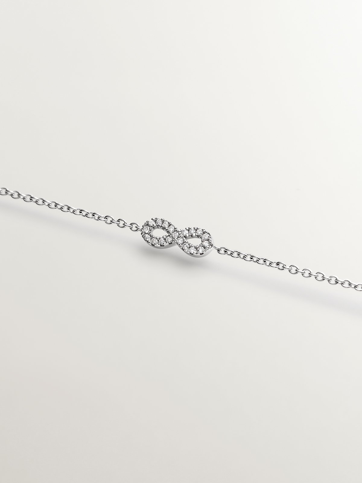 18K white gold diamond infinity pendant