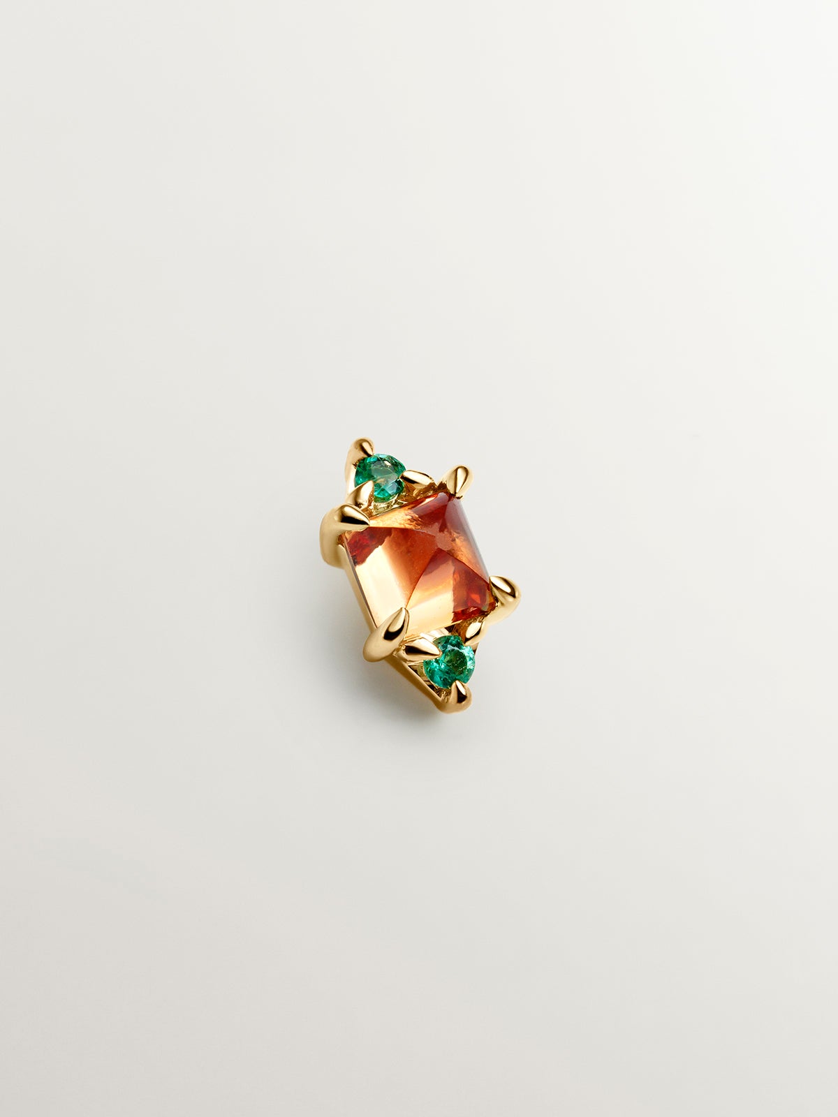 Individual 18k yellow gold pending with orange sapphire and green emeralds