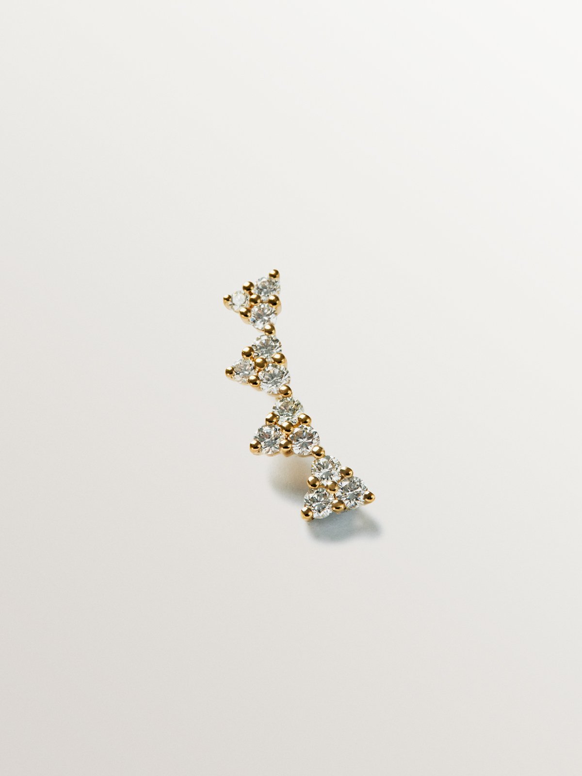 Piercing trepador de oro amarillo de 18K y diamantes en talla brillante