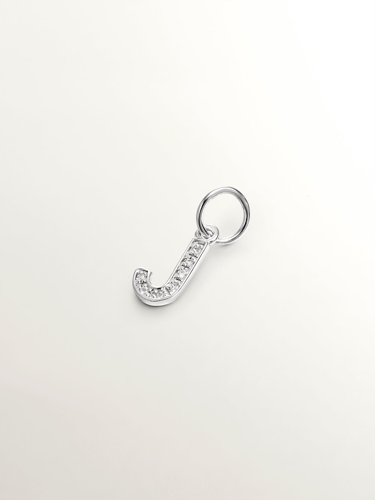 Charm de plata 925 y topacios blancos inicial J