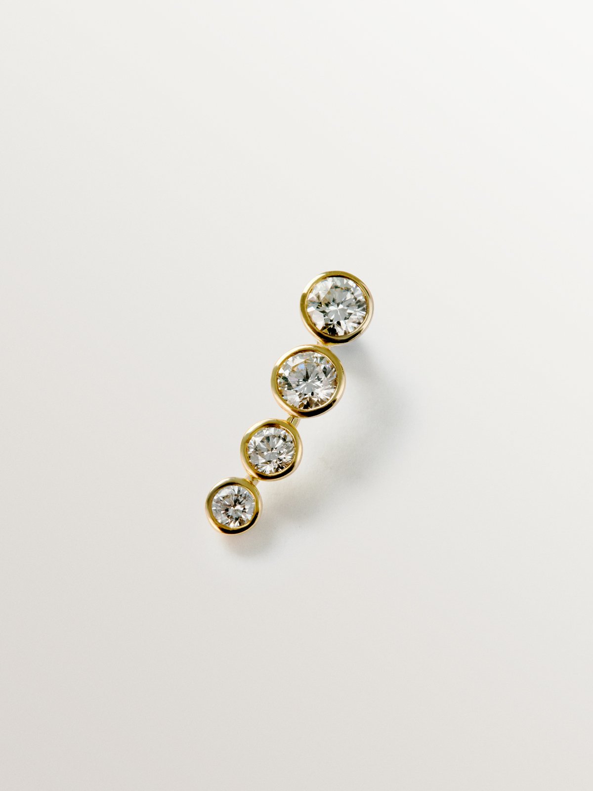 Piercing de oro amarillo de 18K y diamantes en talla brillante