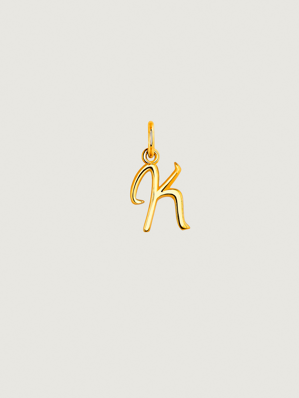 925 Silver charm bathed in 18K yellow gold with initial K.