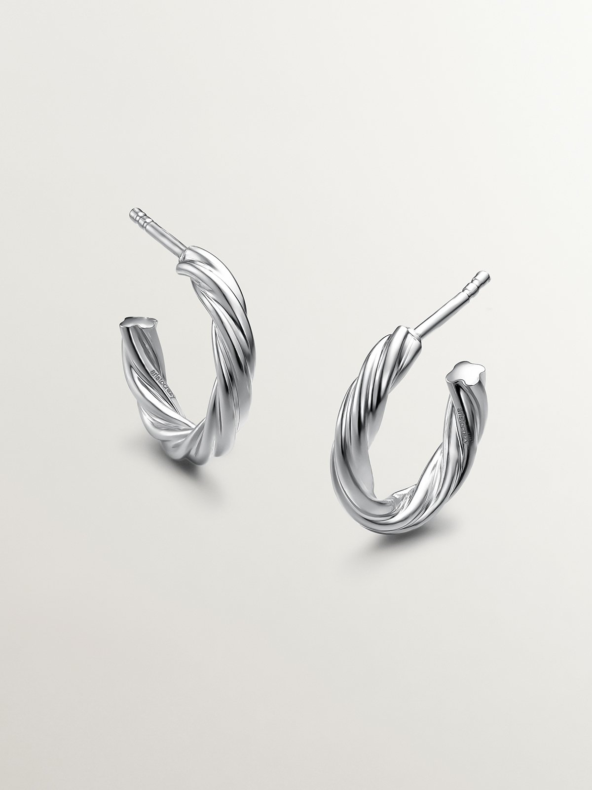 925 Silver hoop earrings with gallooned finish.