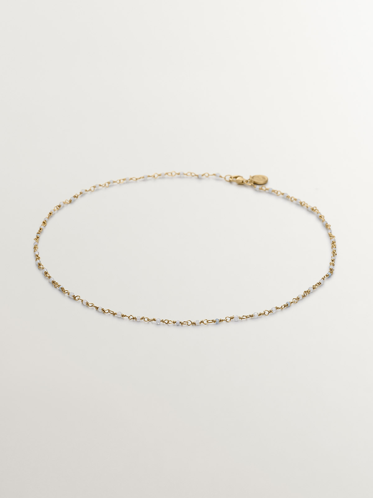 925 Silver chain bathed in 18K yellow gold with aquamarine beads
