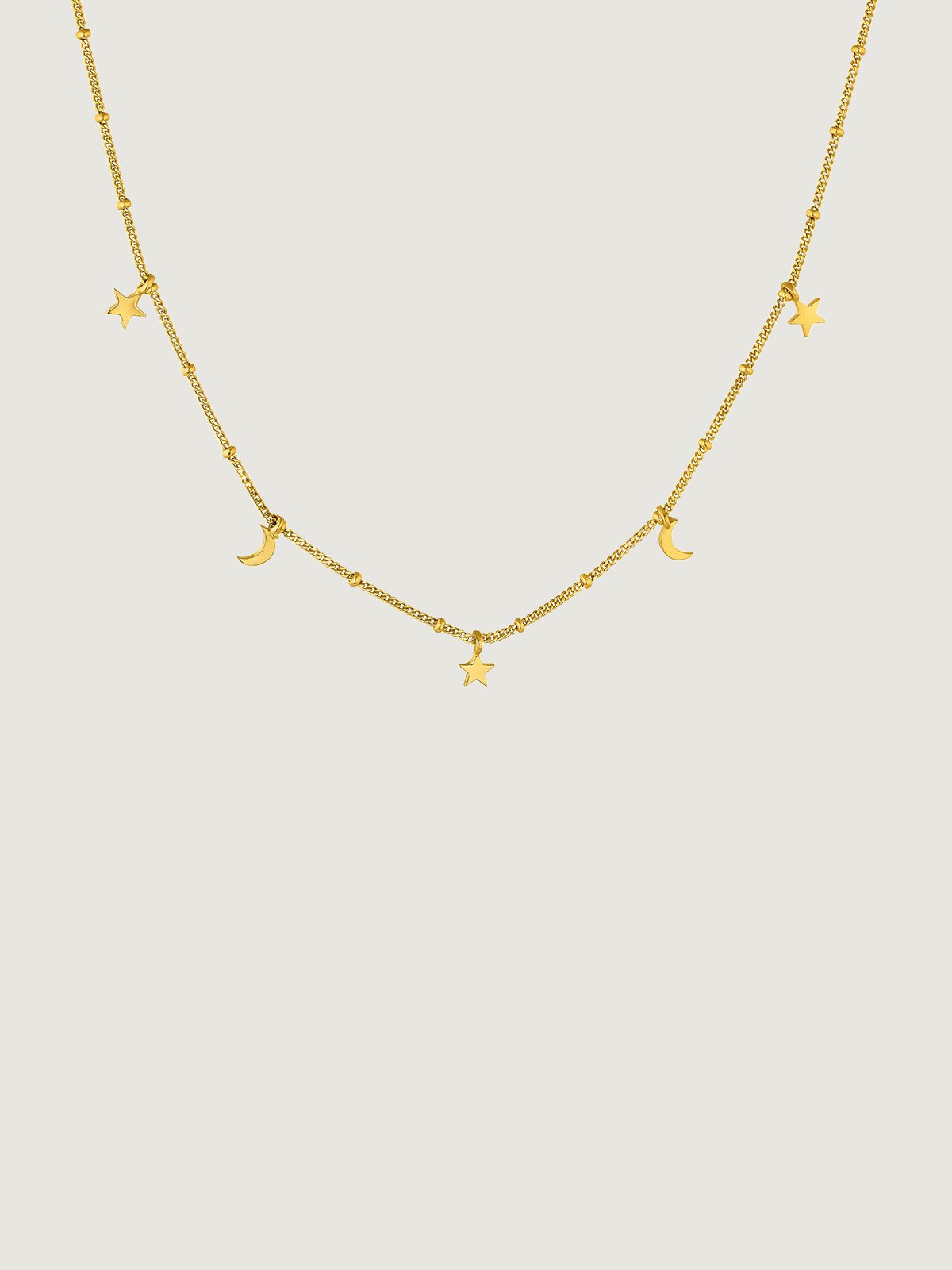 925 Silver necklace coated in 18K yellow gold with stars and moons.